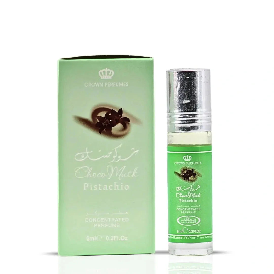 Bilde av esken og parfymeflasken til Choco Musk Pistachio Perfume Oil 6ml Al Rehab side om side